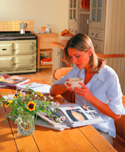 Woman reading near an Aga 6/4